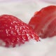 Fresh strawberries fall into yogurt. Organic ripe strawberry. Close up - VideoHive Item for Sale