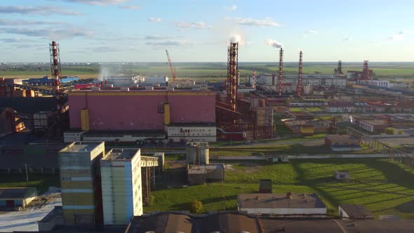 Aerial view of a plant pipes pollute atmosphere.