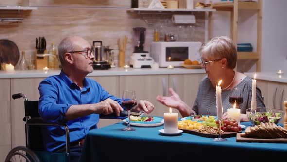 Man with Disabilities Having Dinner