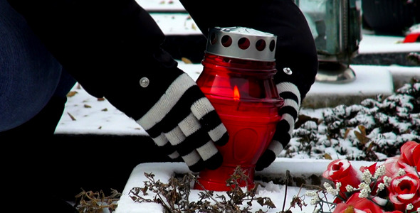 Putting Down A Memorial Candle