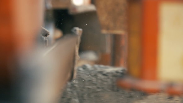 Cutting Wood In a Sawmill