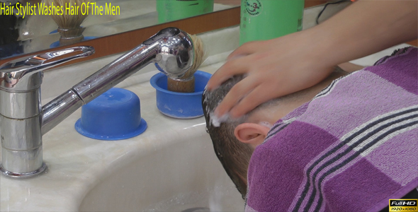Hair Stylist Washes Hair Of The Men