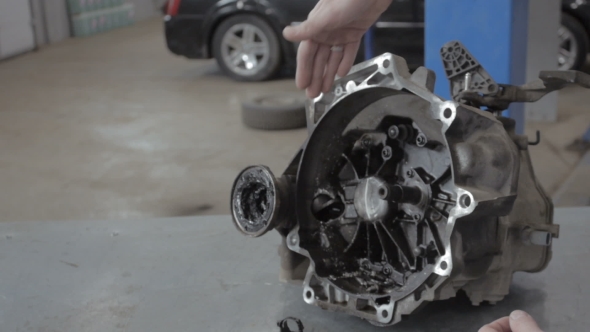 Engineer Hands Fixing Engine Power Transmission Gears Box