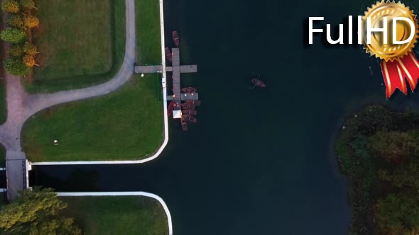 Aerial of the Dock and Lake With Rowing