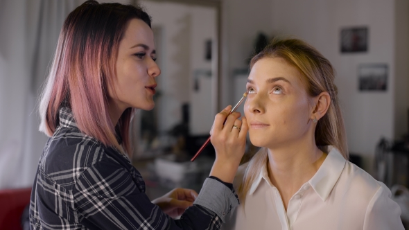 Make-up Artist In The Studio Doing Makeup Beauty Girl