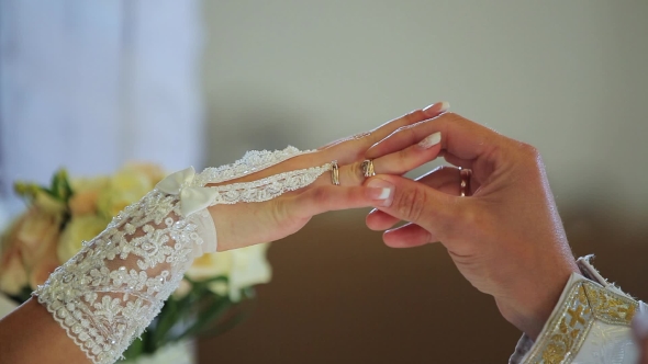 Bride Exchanging Wedding Rings