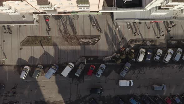 Top View Of The Urban Movement Of People At Sunset