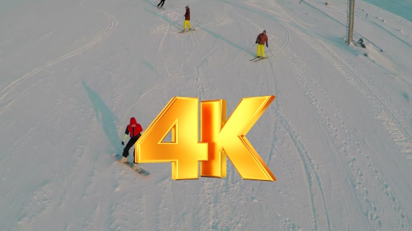 Aerial View Of Skiers And Snowboarders
