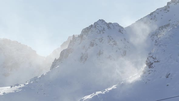 Slow Motion from the top of one of the highest mountains in Pas de la Casa, Andorra. Zoom in made wi