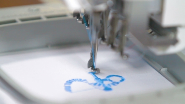 Machine Embroidering On The Shirt