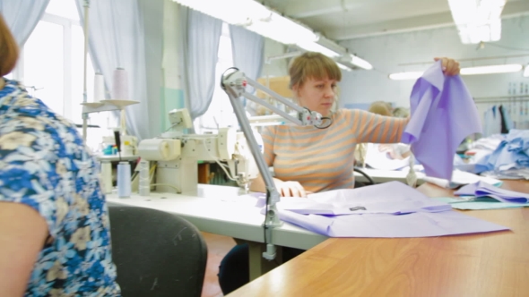 Tailors Working On Sewing Workshop