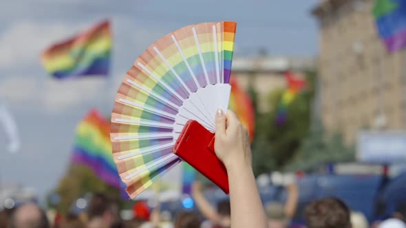 Gay Pride Colors on Fan of Parade Contestant