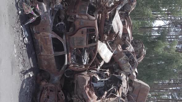 Vertical Video of a Dump of Destroyed Cars During the War in Ukraine