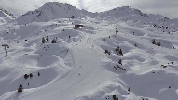 Aerial view of people skiing at a ski resort