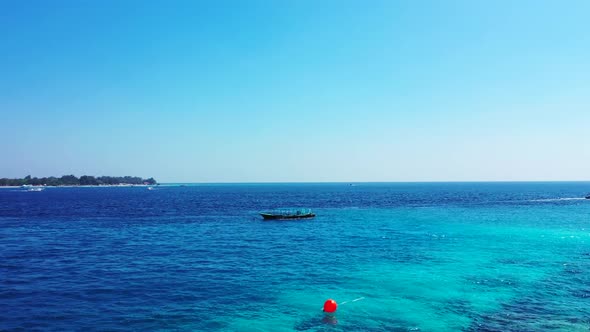 Aerial top view landscape of relaxing sea view beach wildlife by clear lagoon with white sandy backg