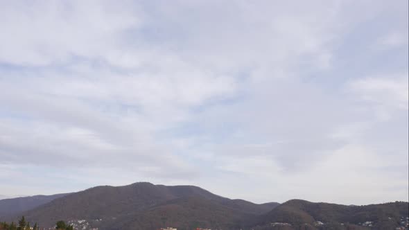 Blue Sky White Clouds Over the Mountains