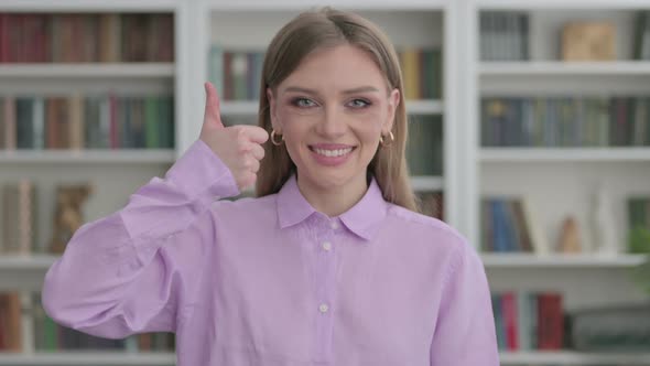 Portrait of Woman Showing Thumbs Up Sign