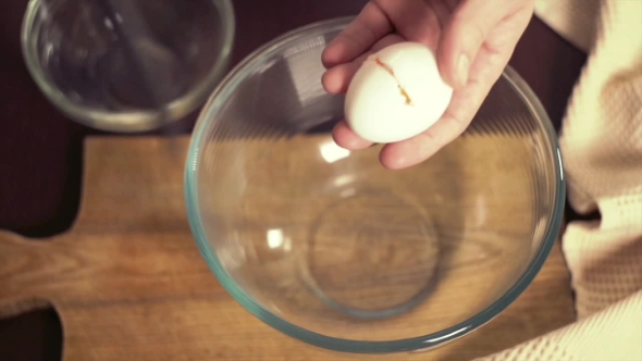 Break Egg. Cooking Food. Baking Ingredients. Separating Yolk From The Protein