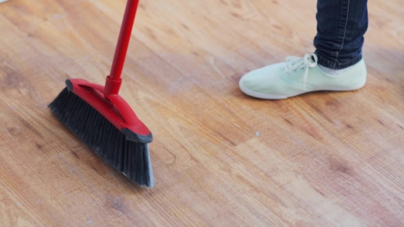 Woman With Broom Cleaning Floor At Home 31