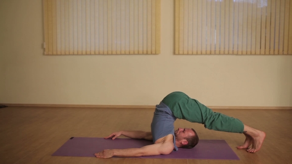 Man Is Engaged In Yoga