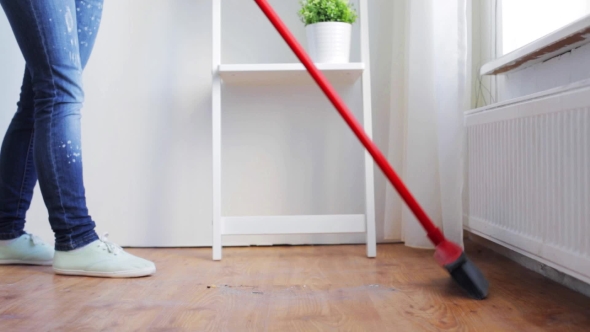 Woman With Broom Cleaning Floor At Home 86