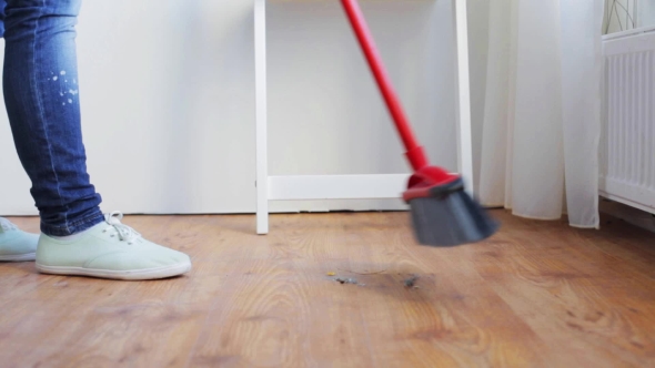 Woman With Broom Cleaning Floor At Home 89