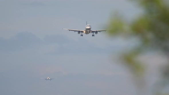 Airplanes Lined Up for Landing