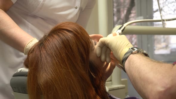 Young Woman in a Chair Dentist Dentistry