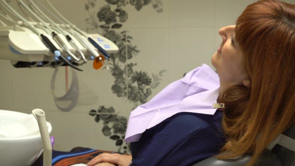 Young Woman in the Dentist's Chair Waiting