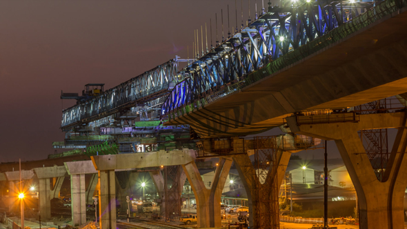 Day to Night at Express Way Construction Site Over Rail Road