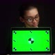 Business Woman Shows a Green Laptop Screen with Tracking Markers - VideoHive Item for Sale