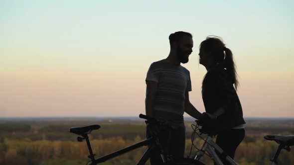 Cyclist Couple at Sunset