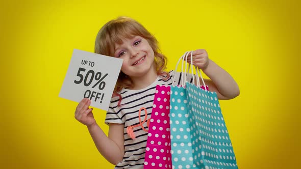 Kid Child Girl Showing Shopping Bags and Up To 50 Percent Off Inscriptions Banner Text Black Friday