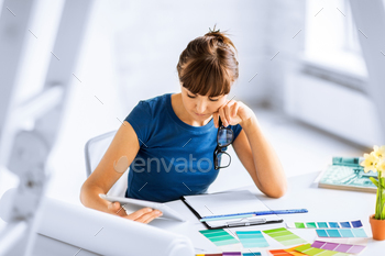  – woman working with color samples for selection