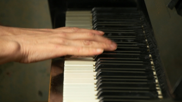 Female Hands Playing Classical Music On a Grand Piano