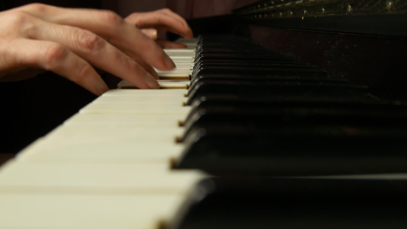 Female Hands Playing a Gentle Piece Of Classical Music On a Beautiful Grand Piano