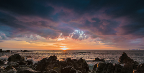 Dramatic Sea Sunset On Rock Shore