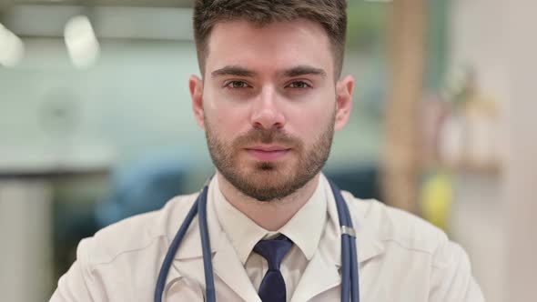 Young Doctor Looking at the Camera 