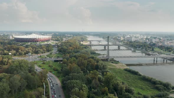 Panoramic Aerial view of Vistula River, Swietokrzyski Bridge and The PGE Narodowy National Stadium