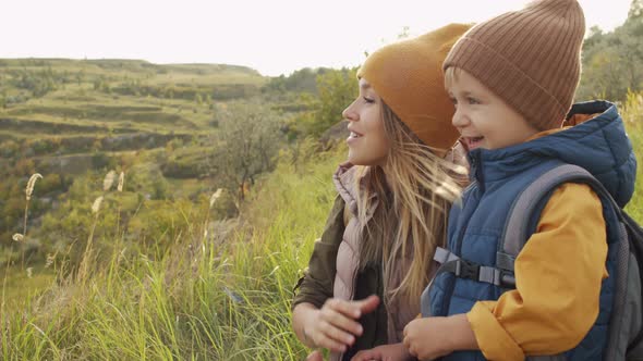 Mother and Little Boy Enjoying Scenery