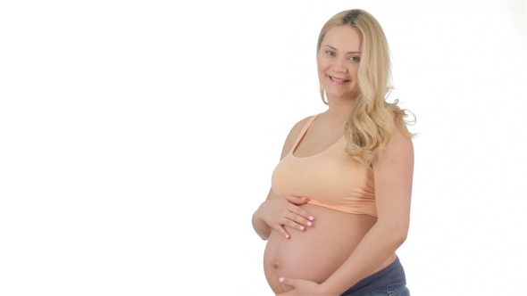 Pregnant Woman Caresses Her Belly