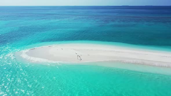 Aerial drone view scenery of perfect island beach adventure by blue sea with white sandy background 