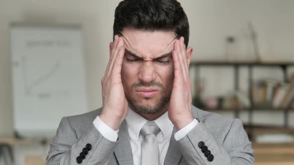 Headache, Stressed Businessman with Pain in Head