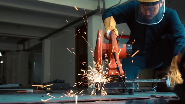 Professional Mechanic is Cutting Steel Metal