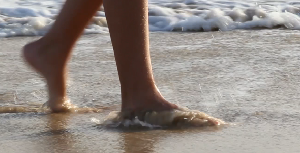 Feets in the Ocean Sand