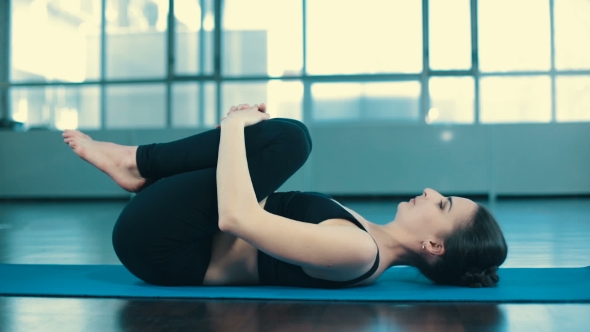 Woman Do Yoga Indoors
