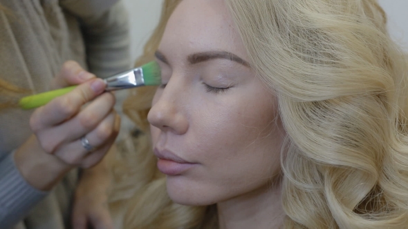 Make-up Artist Doing Make-up Model