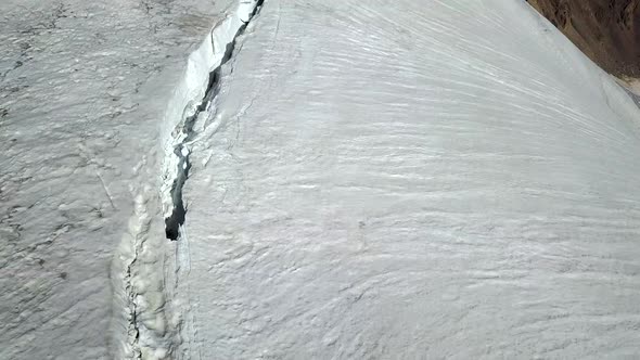 Huge Cracks in the Glacier at the Top of the Peak