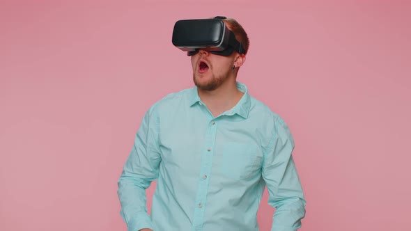 Man Using Virtual Reality Futuristic Technology VR Headset Helmet to Play Simulation 3D Video Game