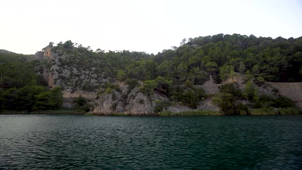 Moving video clip of a cliff along the river in Krka National Park Dalmatia Region Croatia